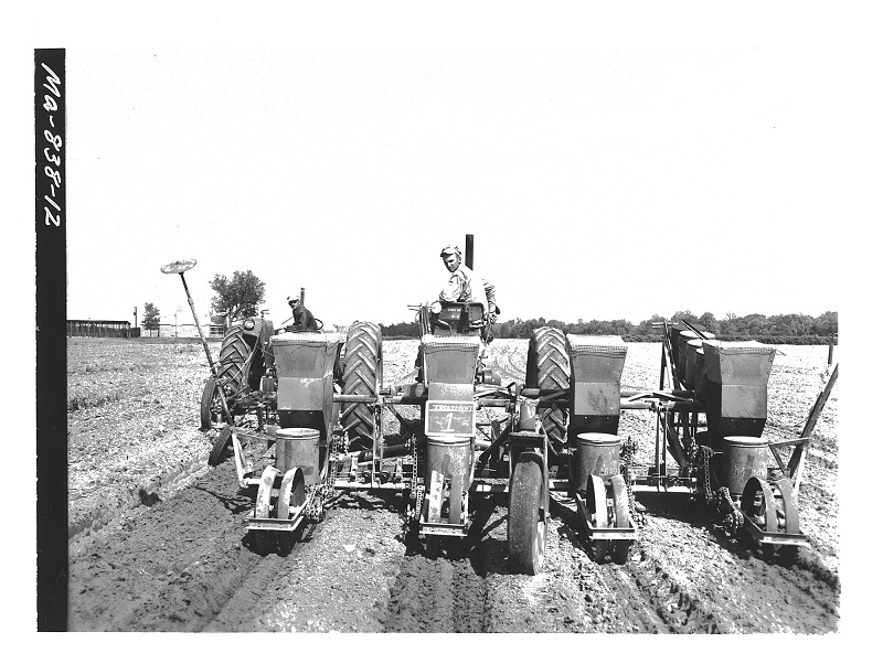Demonstration of a Lister Planter working next to a regular plow