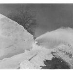 Snowblow trying to plow a very large snow drift