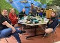 Winning Envirothon team posing with garden tool set gifts