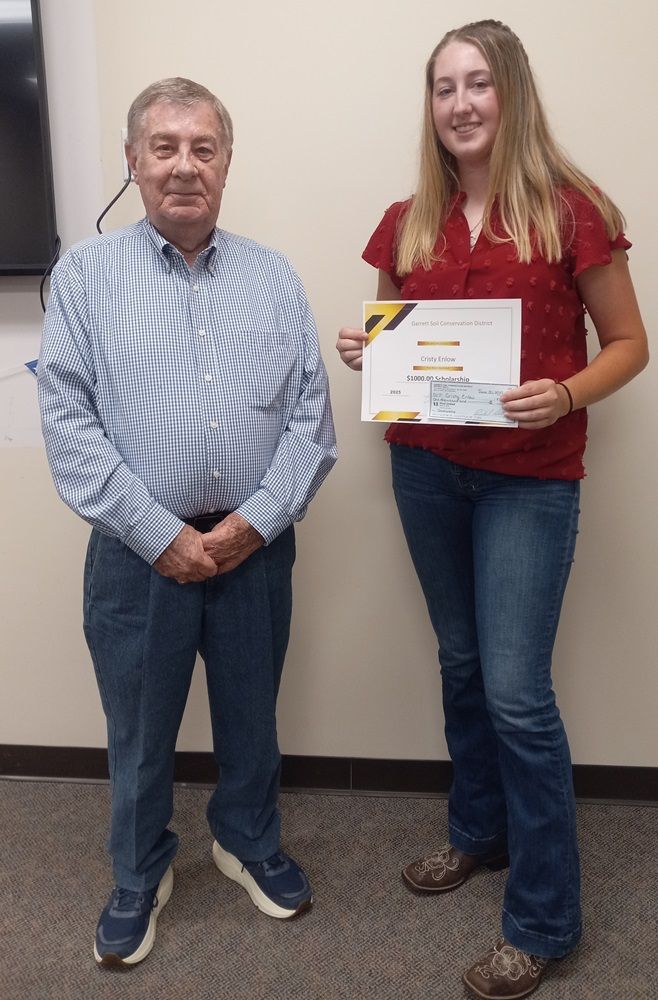 Scholarship winner posing with GSCD former Board President