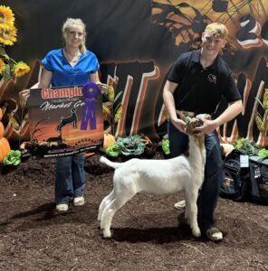 Connor Clary with his grand champion goat at the Garrett County Agricultural Fair