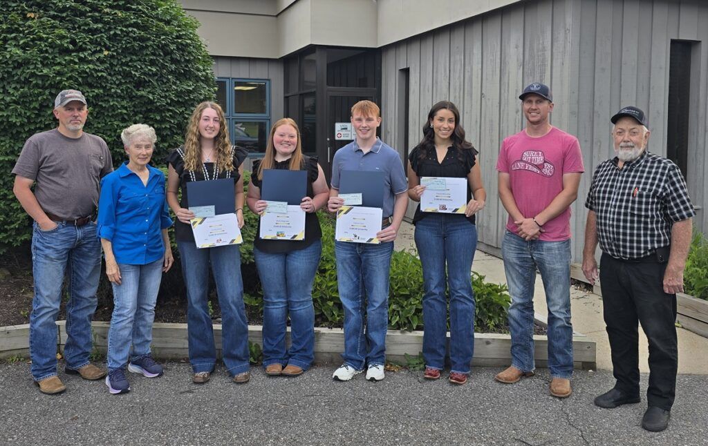 GSCD 2026 Scholarship winners pose with GSCD Board Members with their checks and certificates