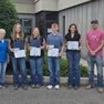 The 4 2026 Scholarship winners pose with the Garrett Soil Conservation District Board of Directors members.